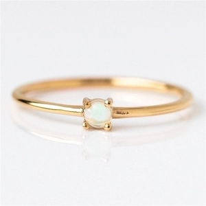 Minimalist 18k gold plated thin ring with round white opal in four-prong setting