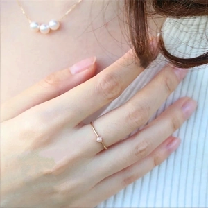 Elegant 18k gold plated thin pearl ring and necklace set on female model