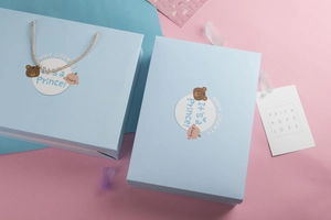 Blue baby gift box and matching carrier bag set for newborn celebrations and birthdays
