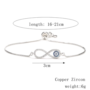 Detail of adjustable infinity evil eye bracelet showing 16-21cm size and 3cm charm width