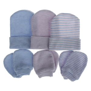 Detail of three sets of striped newborn baby hats and mittens in soft knitted fabric