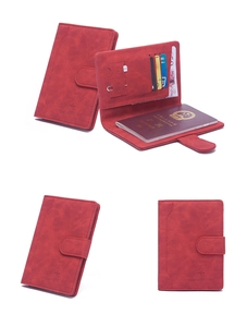 Detail of red PU leather RFID passport wallet with SIM slots and magnetic buckle closure