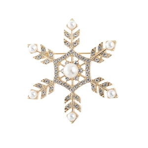 Classic golden snowflake brooch with sparkling rhinestones and elegant white pearls
