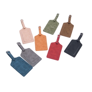 Set of 8 colorful PU leather luggage tags with buckle straps on a white background