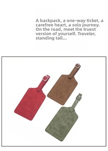 Close-up of three PU leather luggage tags in red, brown, and green with adjustable metal buckles