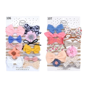 Detail showing 10-piece baby bow headbands sets with floral lace and handmade designs