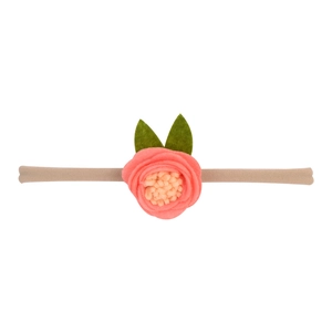 Detailed view of baby elastic headband featuring a pink felt rose and green leaves