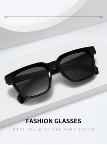 Detail of black square frame sunglasses with CE mark and 52-21-142 size data on temple