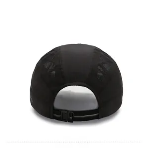 Detail of black quick-dry sports cap showing breathable mesh and adjustable buckle strap