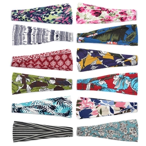 Set of 12 printed elastic yoga headbands in various bohemian and floral patterns