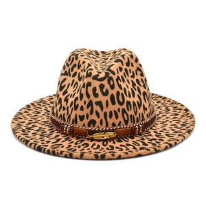 Leopard print fedora hat with a golden feather charm and beaded band on white background