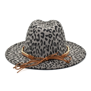Men's leopard print fedora hat with brown studded band and vintage ribbon detail
