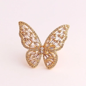 Luxury gold butterfly ring with micro-pave cubic zirconia in an adjustable open design