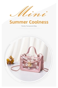 Detail of pink transparent daisy jelly bag with PVC texture and golden metal clasp