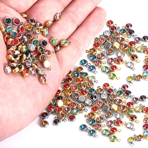 Colorful round crystal birthstone pendants with gold and silver stainless steel base