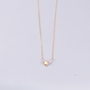 18K gold plated titanium necklace with cubic zirconia pendant on bamboo chain