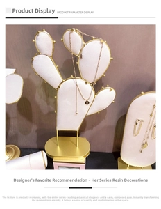 Detail of Her Series cactus jewelry display rack with gold metal and white flocking finish