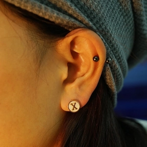 Titanium steel 18K gold letter X stud earring with white shell inlay for women