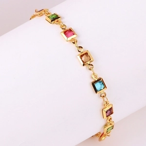 Detailed macro view of 18K gold-plated bracelet with multi-colored square zircons