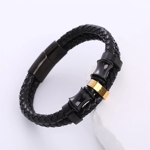 Men's black braided leather bracelet with black and gold stainless steel magnetic clasp