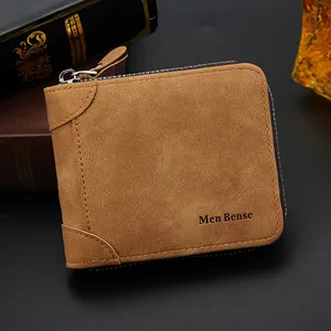 Detailed shot of vintage brown frosted leather wallet with durable metal zipper closure