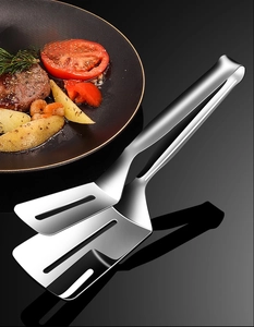 Close-up of a 304 stainless steel food tong with oil draining slots and bright finish
