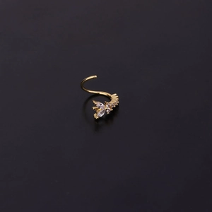 Gold plated curved cartilage earring featuring a zircon-inlaid flower and butterfly design