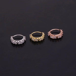 Three-color hoop earrings in silver, gold, and rose gold with zircon side stones