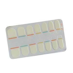 Matte nude daisy and dot French nail stickers with orange and blue line patterns