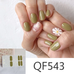 Detail of QF543 nail stickers featuring olive green and white daisy flower patterns