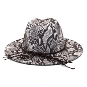 Classic wide brim fedora hat featuring snakeskin print and dark brown string knot detail