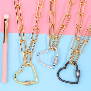 Collana a catena spessa con chiusura a vite a forma di cuore in oro, argento e nero