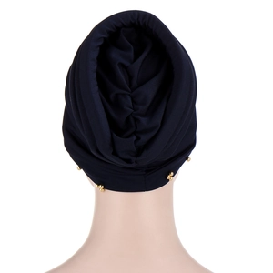 Navy blue turban cap for women featuring elegant gold beads and pleated back design