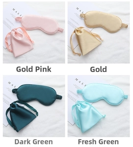 Detail view of imitation silk sleep mask set including a matching drawstring storage bag