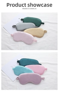 Close-up of silk sleep masks in various colors with matching elastic headbands