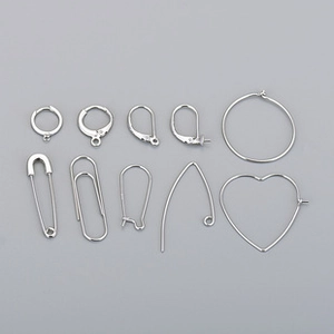 Macro view of various S925 sterling silver DIY jewelry findings and earring hooks
