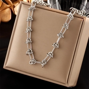 Silver twist chain necklace in titanium steel on luxury jewelry box, punk hip hop style