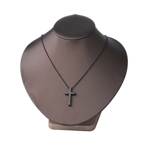 Polished black titanium steel cross pendant necklace displayed on a mannequin