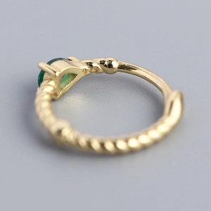 Minimalist S925 sterling silver twist ring with a pear-cut green gemstone accent