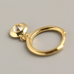 Elegant gold-plated S925 sterling silver hoop earrings featuring a round bezel-set zircon