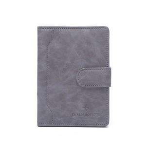 Gray RFID passport wallet with buckle and airplane logo on a white background