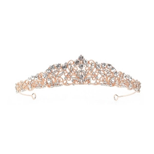 Close-up of rose gold bridal tiara with intricate filigree and sparkling crystals