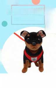 Front view of a red mesh pet harness with paw logo on a dog mannequin display