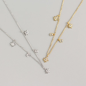 Elegant S925 sterling silver star necklace with zircon in gold and silver finishes