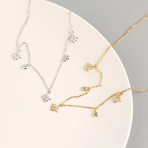 Minimalist S925 sterling silver necklace with star pendants and zircons in gold and silver
