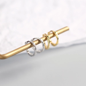S925 sterling silver hoop earrings in gold and silver with textured twisted wire design