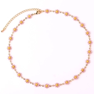 Detail of pink daisy pendant necklace with 18K gold chain and lobster clasp closure
