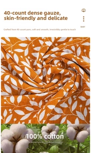 Detail of 40S high-density cotton swaddle blanket with orange leaf print texture