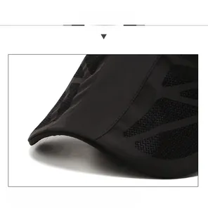 Close-up of black quick-dry cap brim with breathable mesh and durable double stitching