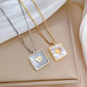 Minimalist square mother of pearl pendant necklace with heart detail in gold and silver